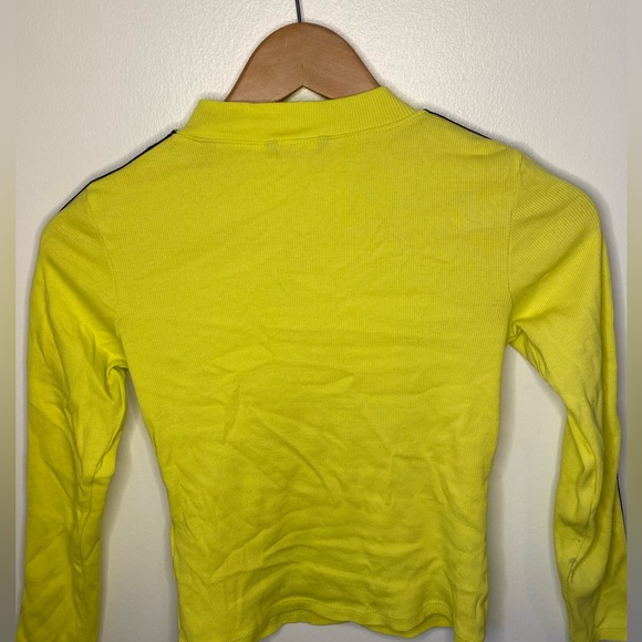 Neon green top with letter detailing on the sleeves - Picture 2 of 3
